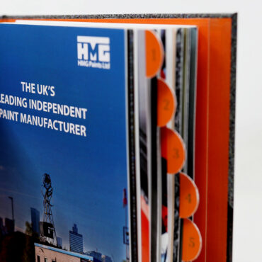 the first page of the Surface Preparation & Coating Application Guide, with an image of the Manchester based paint factory HMG Paints, the uks leading paint manufacturer